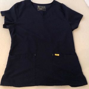 Figs scrub top with the vintage yellow stamp